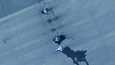 Satelliittikuva näyttää ainakin yhden vahingoittuneen Mig-29-hävittäjän Merowen lentotukikohdassa tiistaina 18. huhtikuuta.