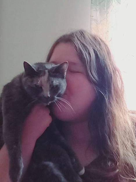 Petra Tuomisen vuosi vaihtui muun muassa Minni-kissan seurassa.