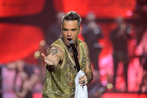 Robbie Williamsin show rantautui sunnuntai-iltana Tampereelle ja veti Nokia-areenan täyteen yleisöä.