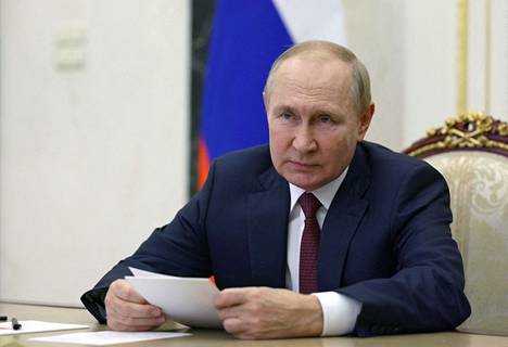 Venäläisen Sputnik-median välittämä kuva Vladimir Putinista turvallisuus- ja tiedustelupäälliköiden kanssa pidetystä kokouksesta 29. syyskuuta.