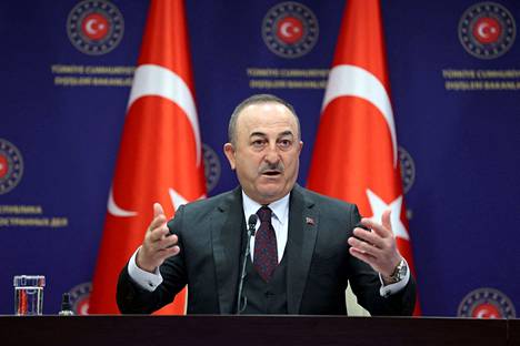 Mevlut Cavusoglu tiedotustilaisuudessa Ankarassa 27. joulukuuta.