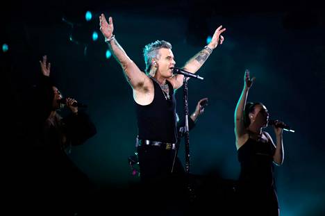 Robbie Williams on esiintynyt Suomessa jo kolme kertaa, viimeksi vuonna 2017. Kuvassa hän esiintyy elokuussa Saksassa.