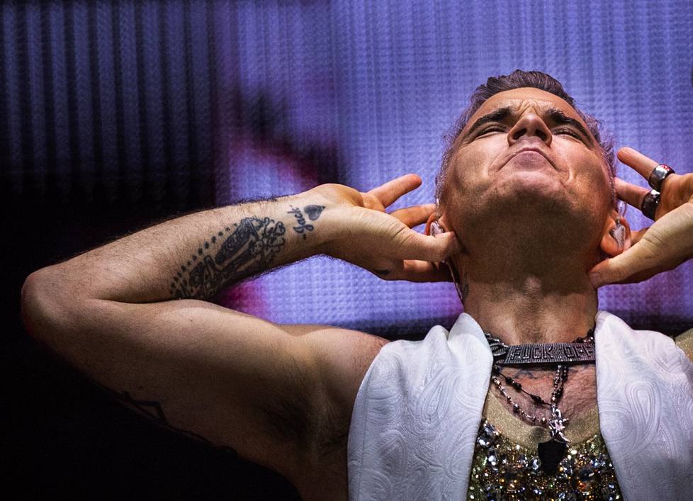 Mitä kuuluu? Robbie Williamsin ja yleisön vuorovaikutus oli Tampereella saumatonta.